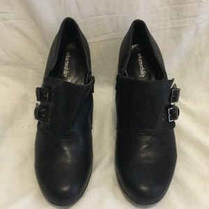 Black buckle high heel bootie